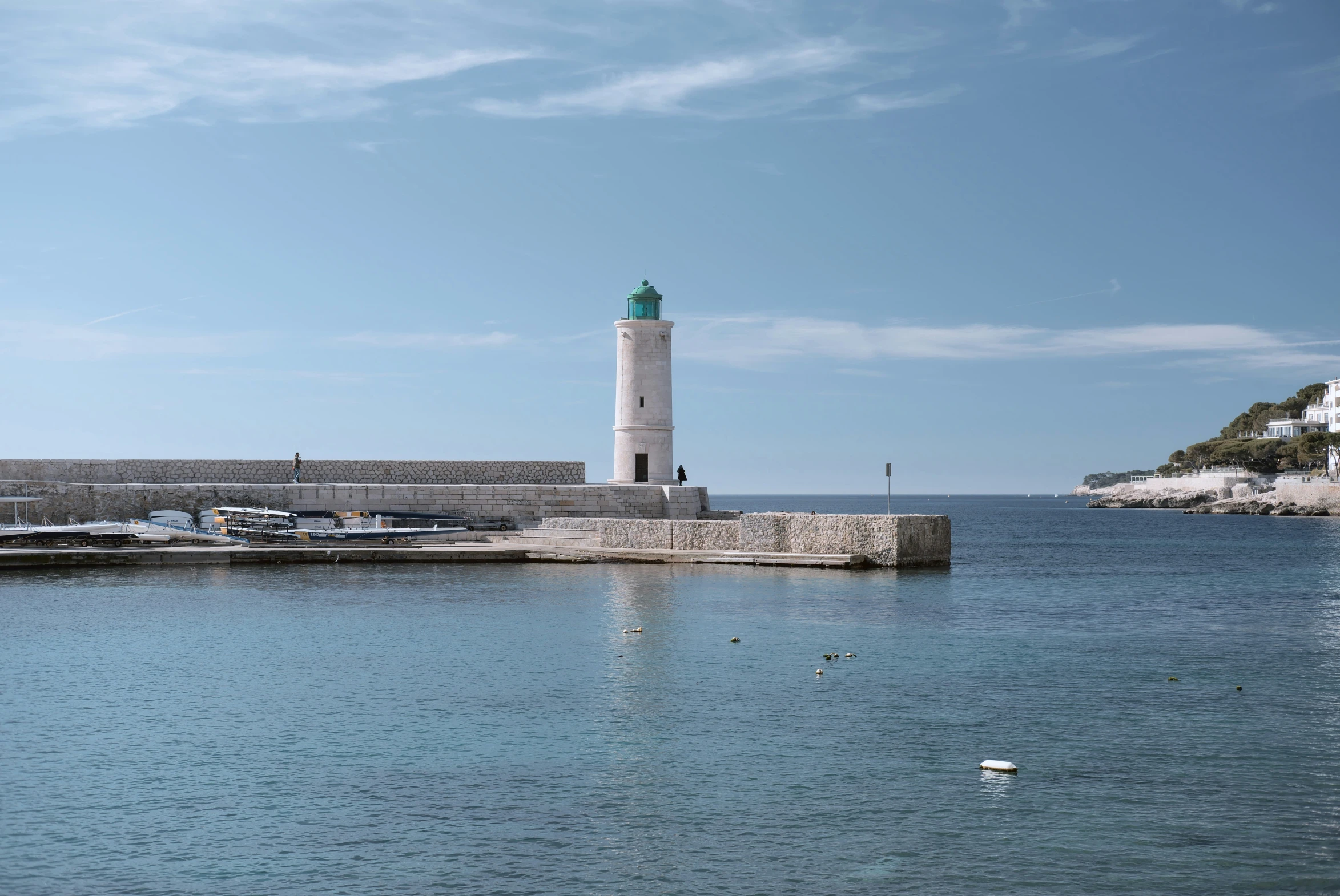 there is a lighthouse on top of the water