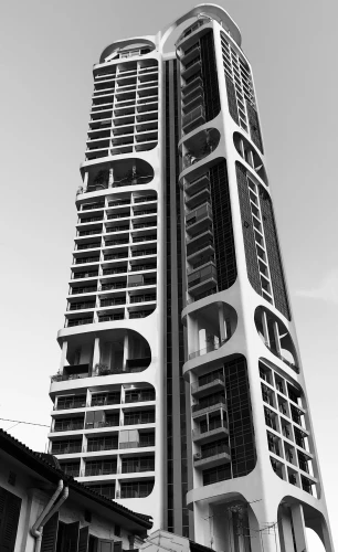 a tall building that has several balconies on it