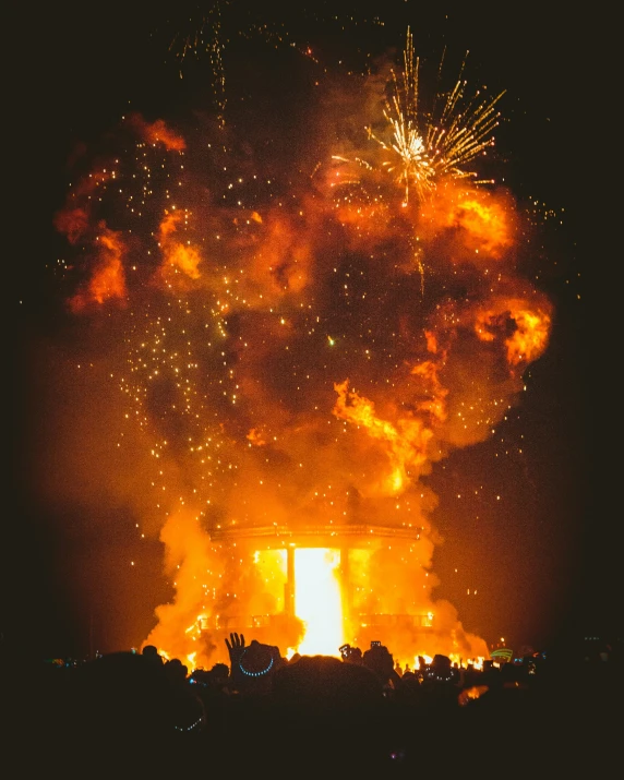 an intense firework show on top of a building