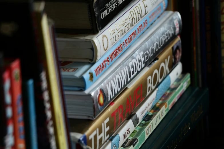 an image of a stack of books on the floor