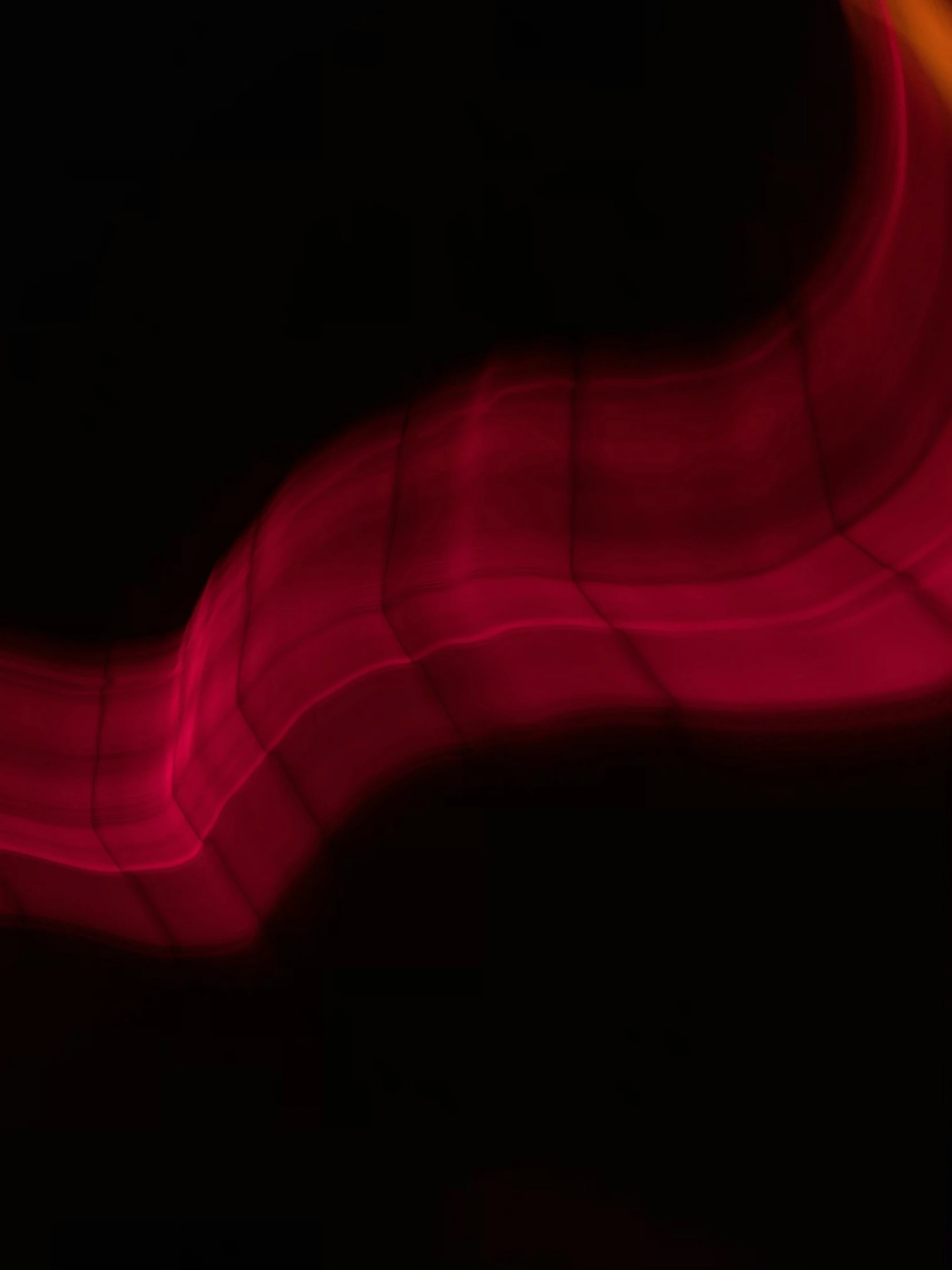 the image shows red waves in the dark