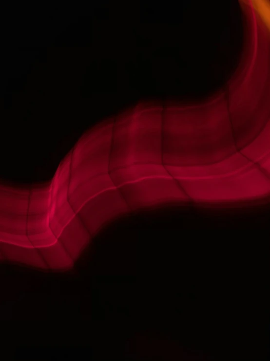 the image shows red waves in the dark