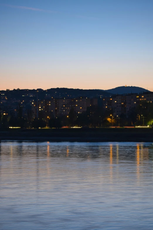 some lights on the city from the water