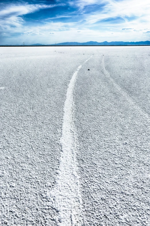 a path made in the snow going through nowhere