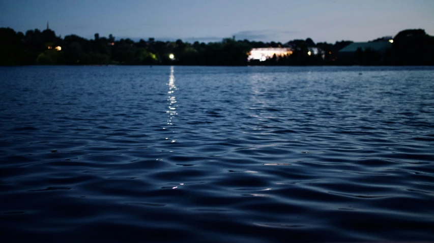 a body of water that has some reflections on it