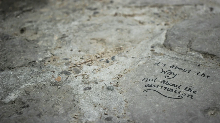 a close up of graffiti on the cement