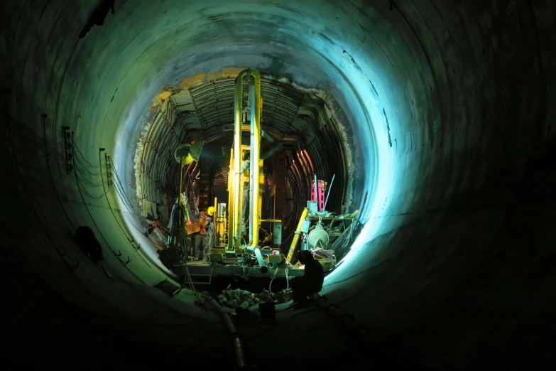 a construction site inside of a very large pipe