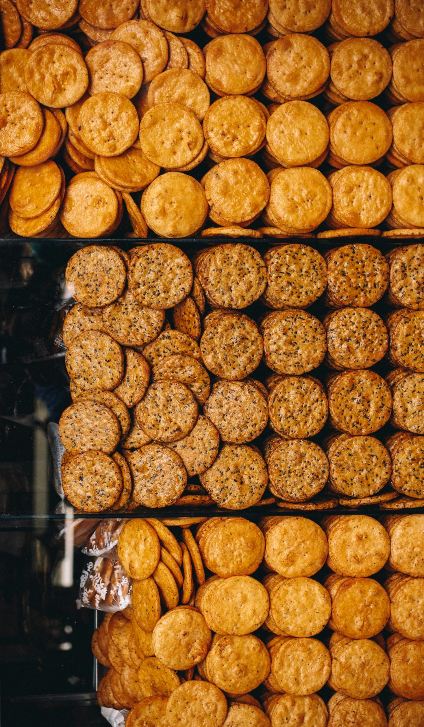 several trays with small, round food items next to each other