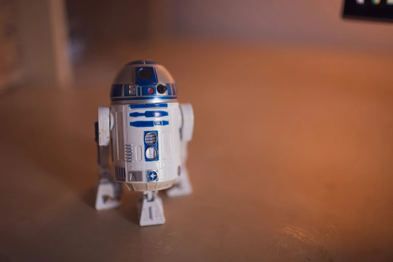 a star wars robot is placed on a counter