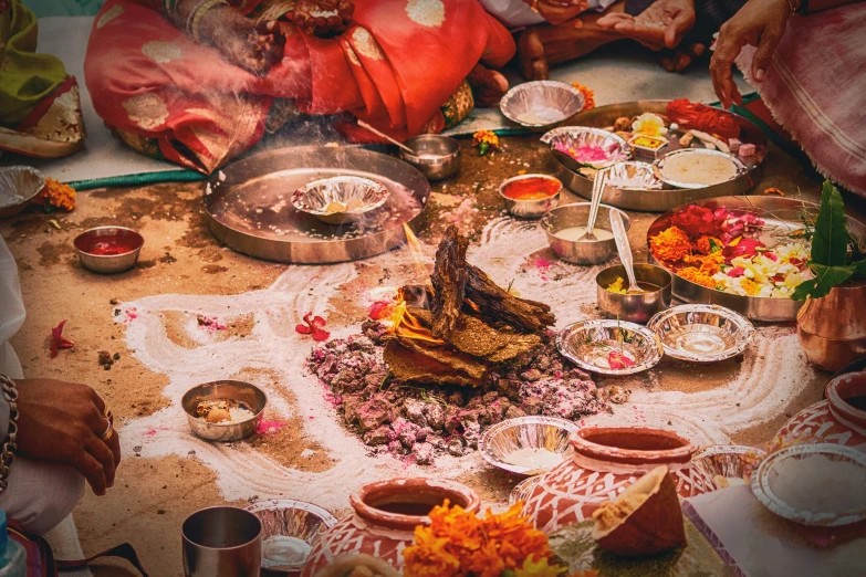 a colorful feast consisting of chicken, bowls and plates