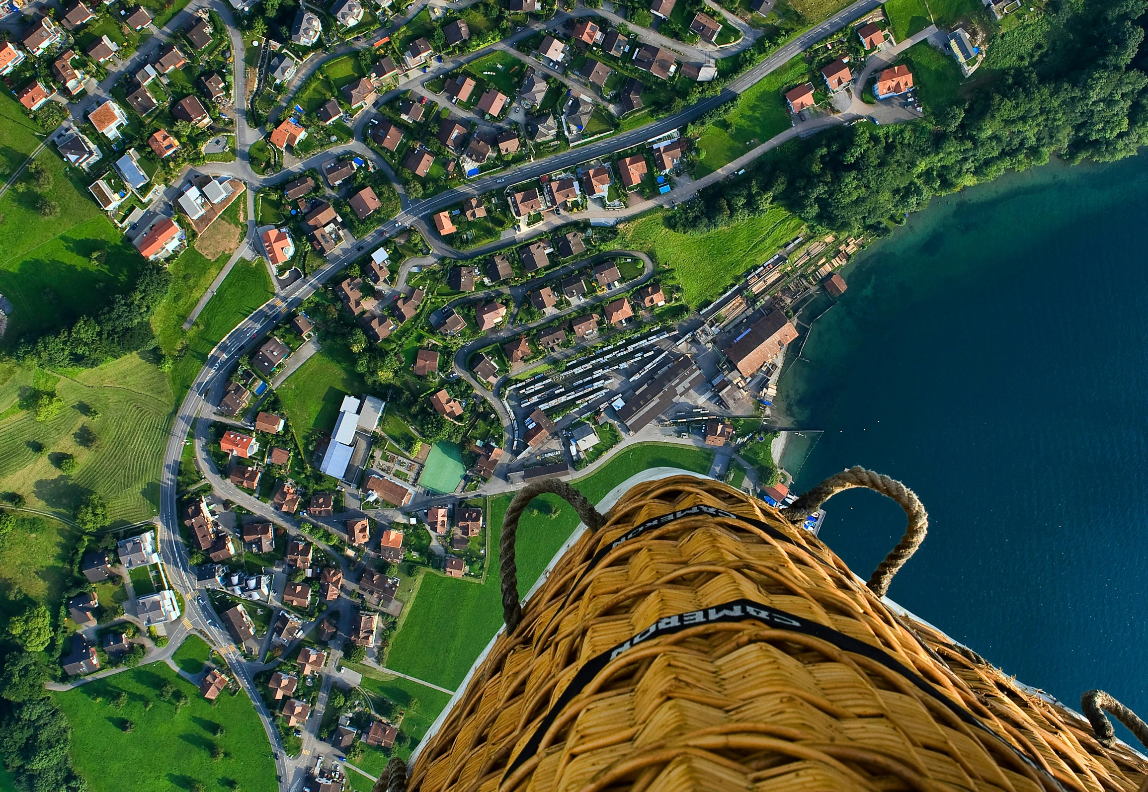 the view looking down from the top of the building with a man's feet in the air