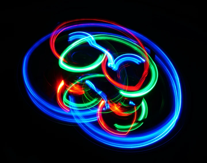 a colorful neon ring on a black background