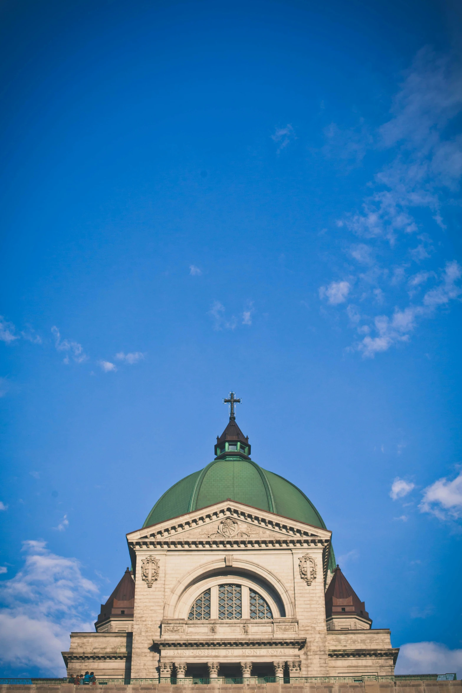 a building with a large dome, with two clocks on the top