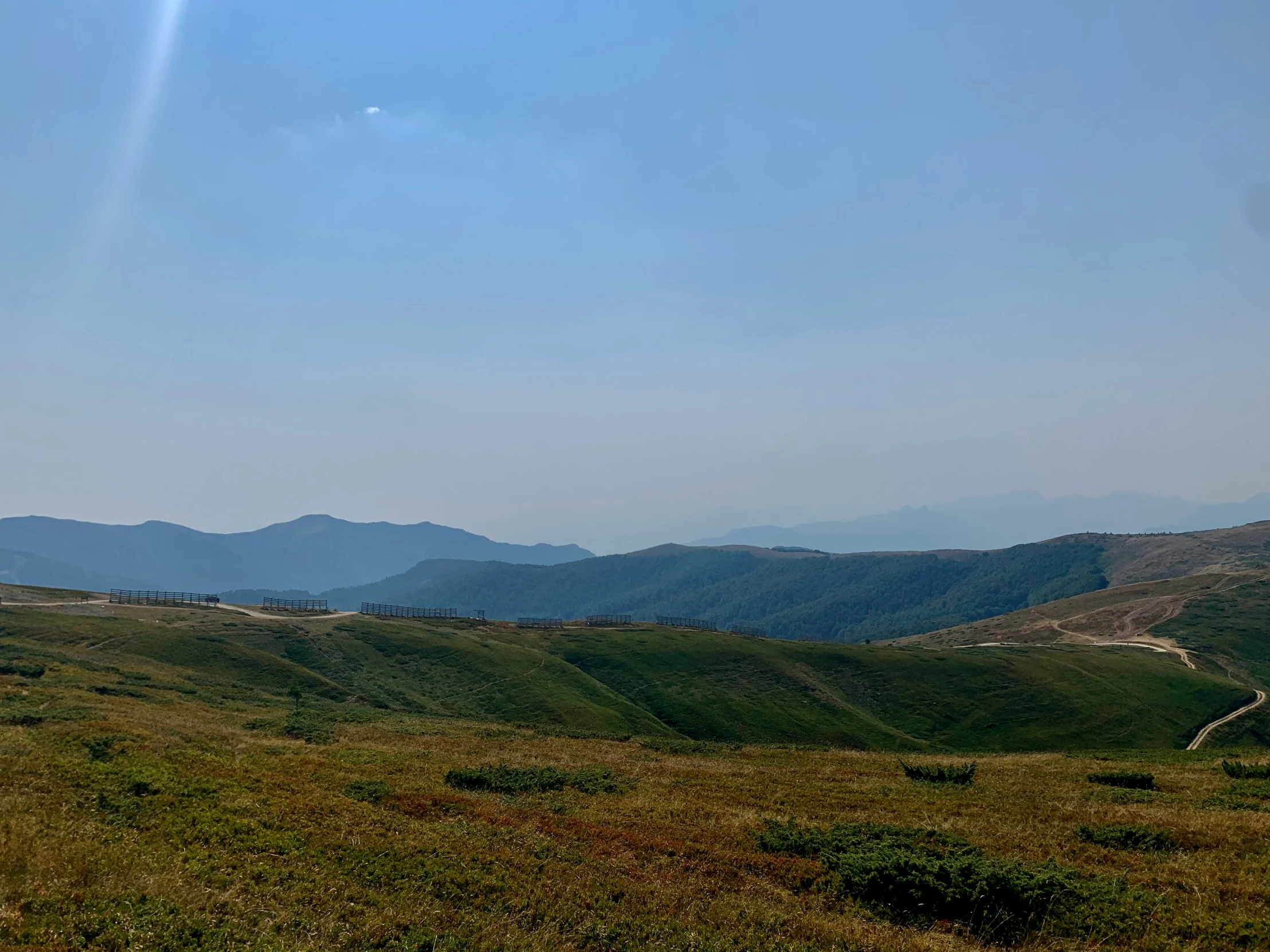 a landscape with hills and hills in the background