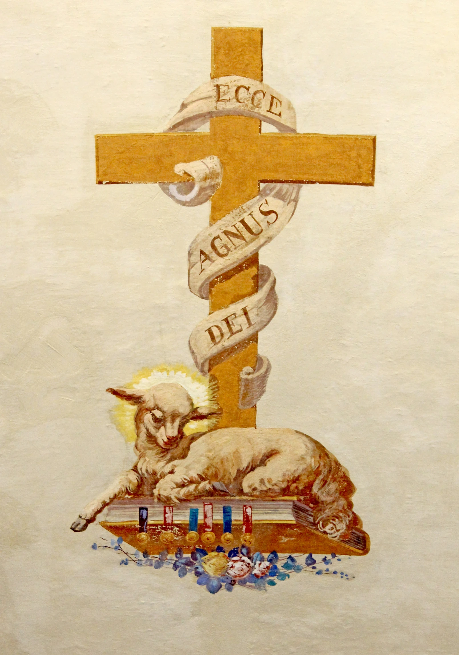 a drawing of a sheep with the words lecot and a cross