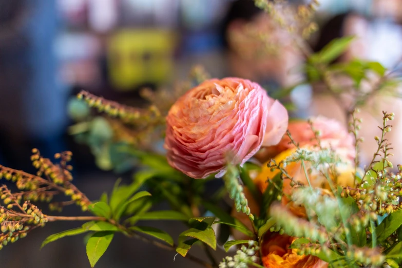 some flowers that are in a vase on the table