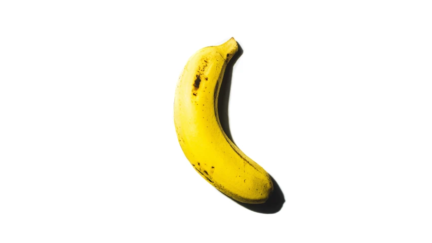 a banana is shown up high in the air