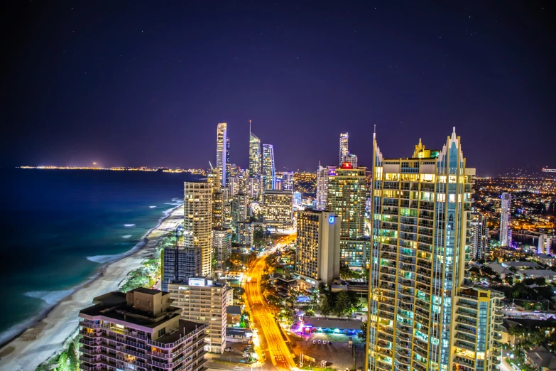 a cityscape of miami at night with bright lights