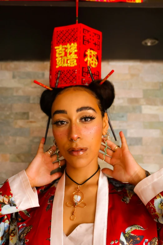 a woman with two chinese symbols on her head