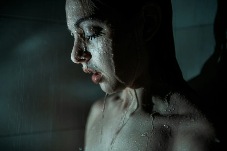 woman with body covered in white powder standing in water