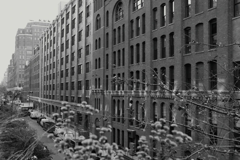 there is an old black and white po of a city street