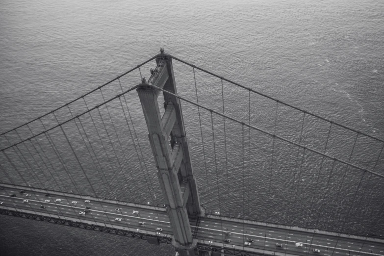 black and white po of the suspension bridge in new york city