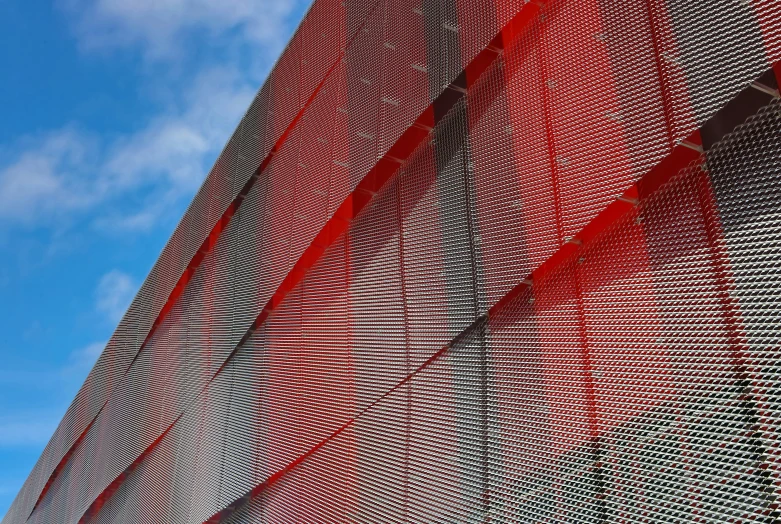 abstract pograph of red net flying in a blue sky