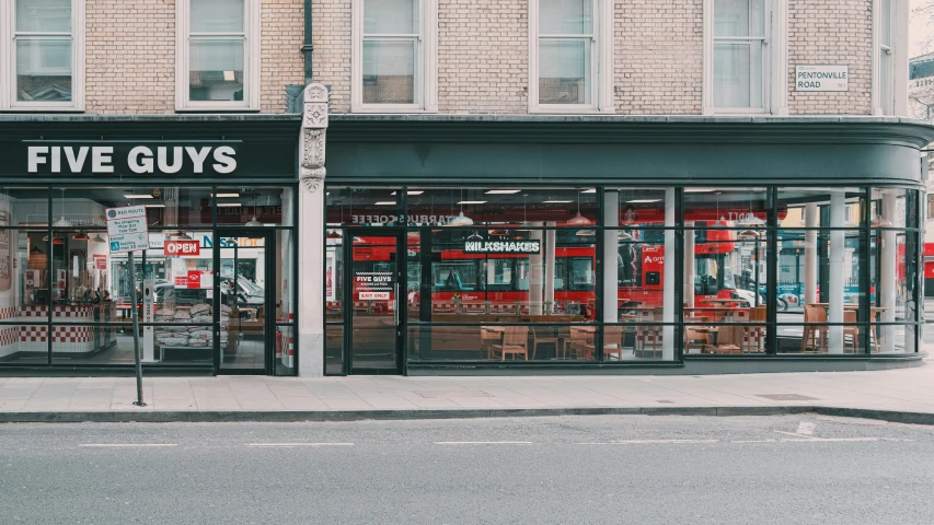 a shop with three rows of boxes in front