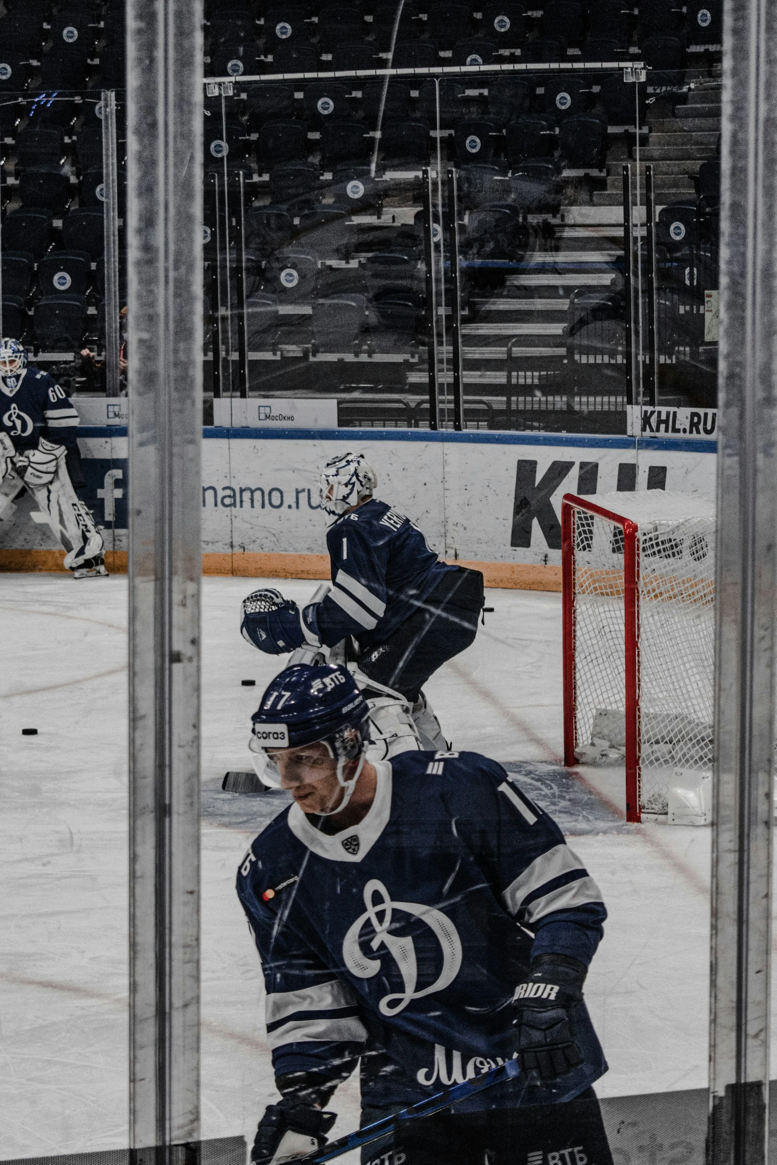 an ice hockey player about to enter the goal