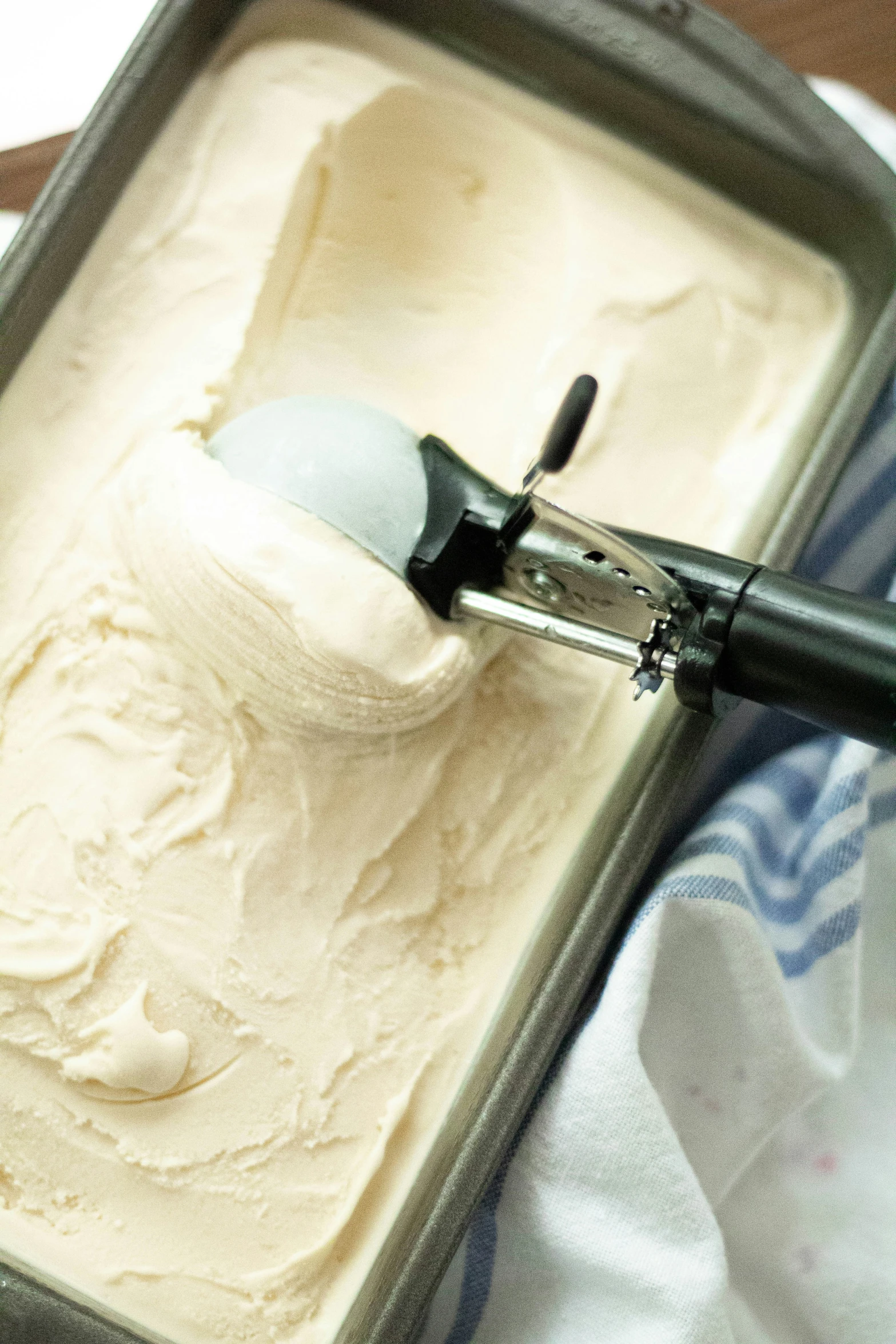 a scoop of ice cream and an old fashioned razor