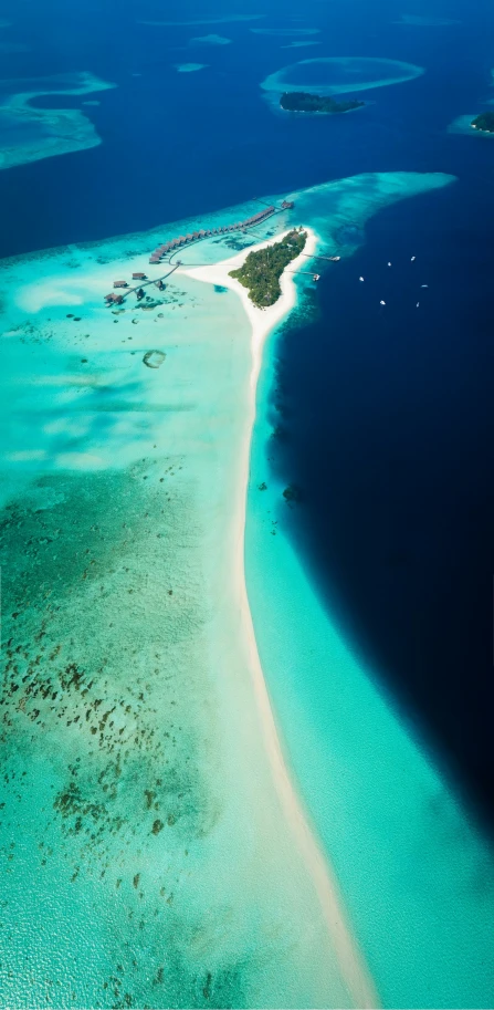 an aerial view of an island near a body of water