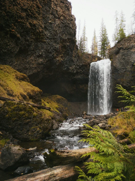 the waterfall is made out of rocks and water