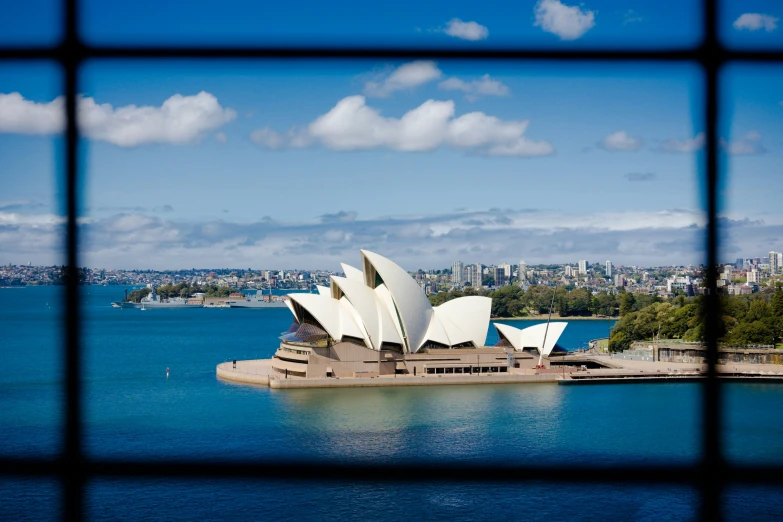 the opera house is seen through the lattice