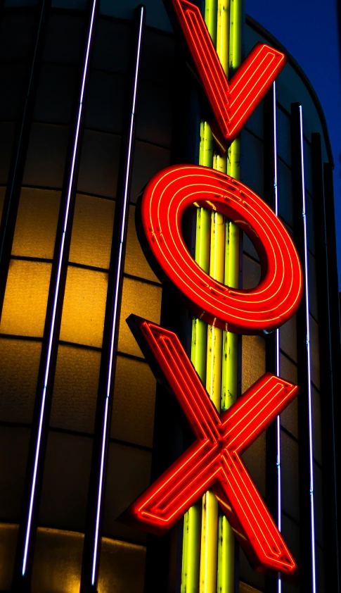 a very bright neon sign is lit up by various lines
