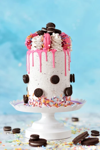 a cake that has sprinkles and icing on it