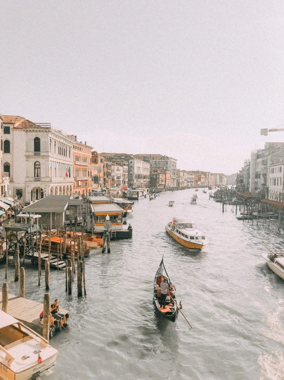 a waterway that is empty, with a small boat floating in the water