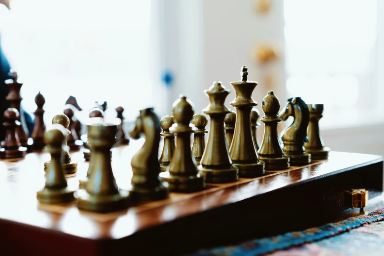 an image of a set of chess pieces on a table