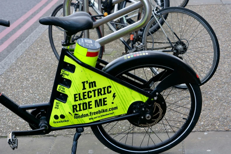 a bicycle parked along the side of a road