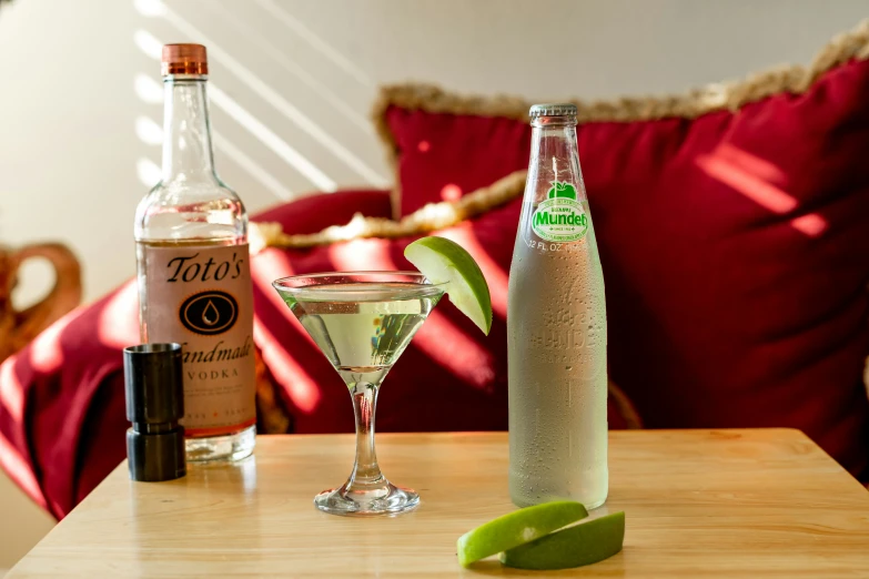 an old fashioned alcohol bottle on a table