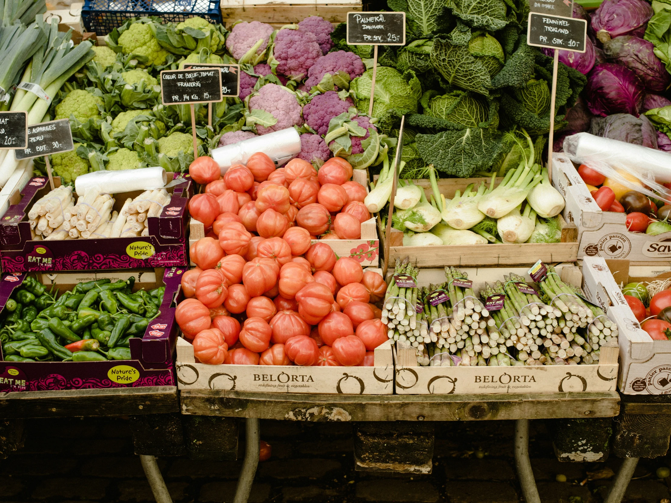 some baskets of different kinds of vegetables