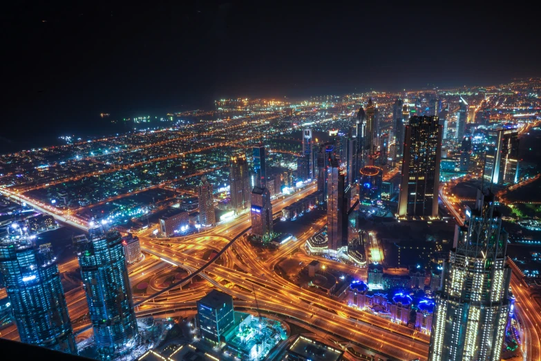 night view of downtown area with many streetlights and buildings