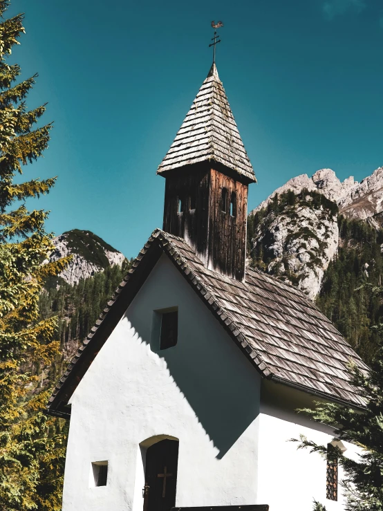 this old chapel has been built in the mountains