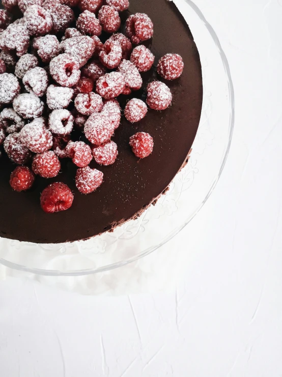 chocolate cake with red berries in the center