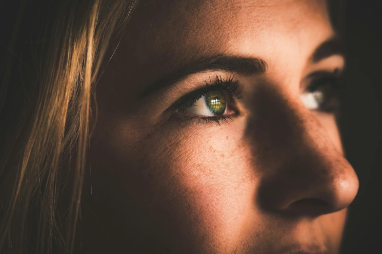 close up of a female with blue eyes