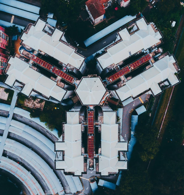 an aerial view of some houses that have red doors