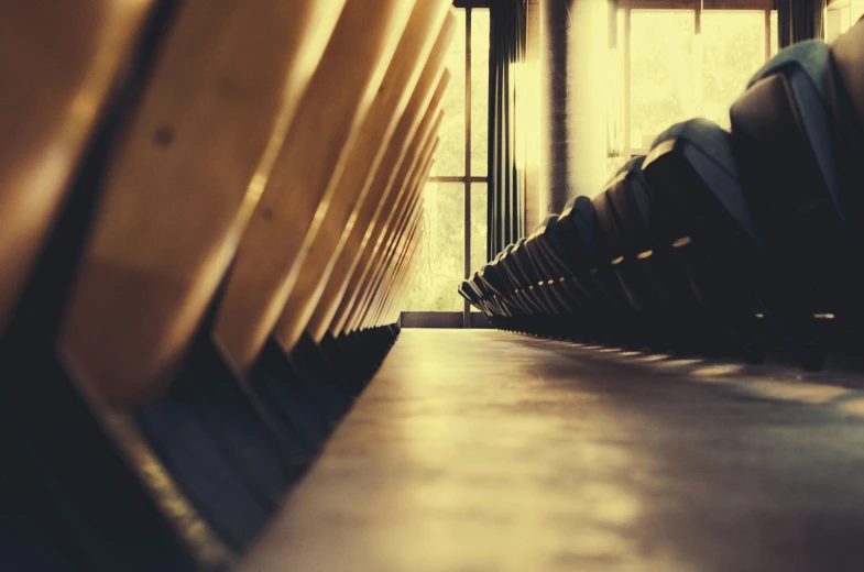 rows of benches line the front of a train station