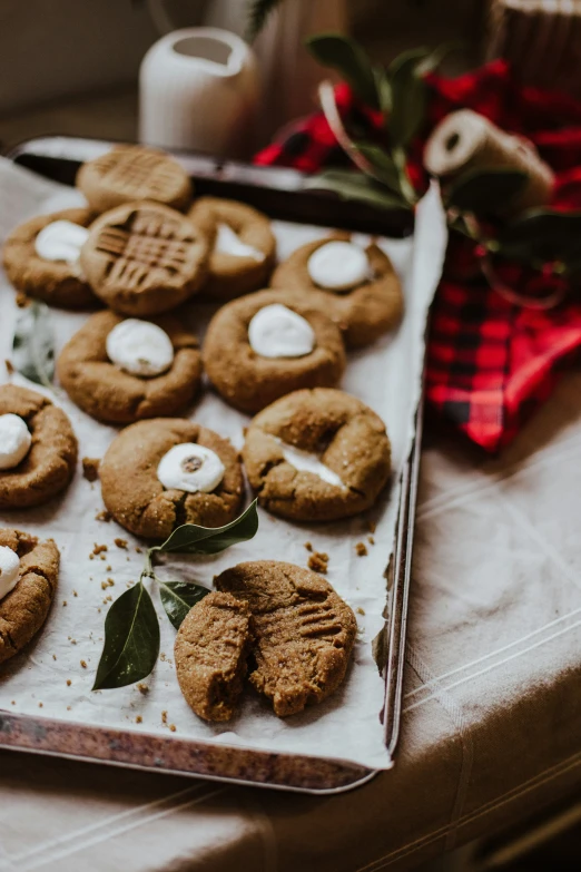 cookies decorated with marshmallows and decorated with leaves