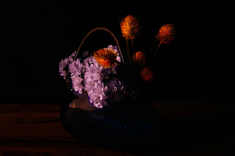 some flowers in a vase on a table