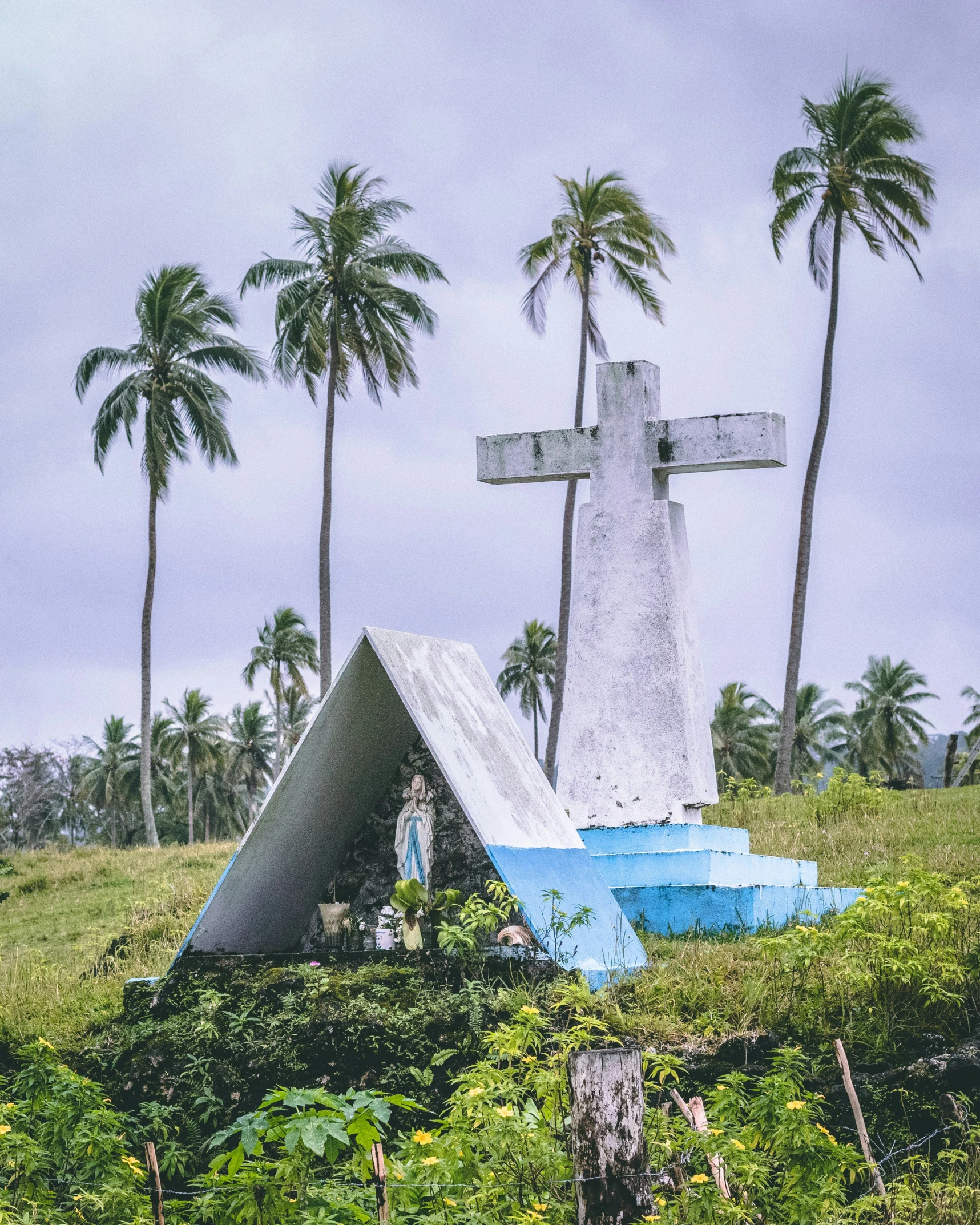 the cross is on the top of the hill