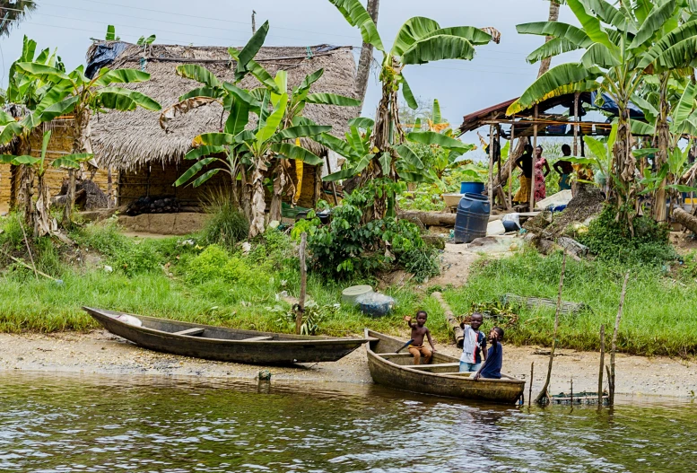 people are fishing in small boats in a body of water